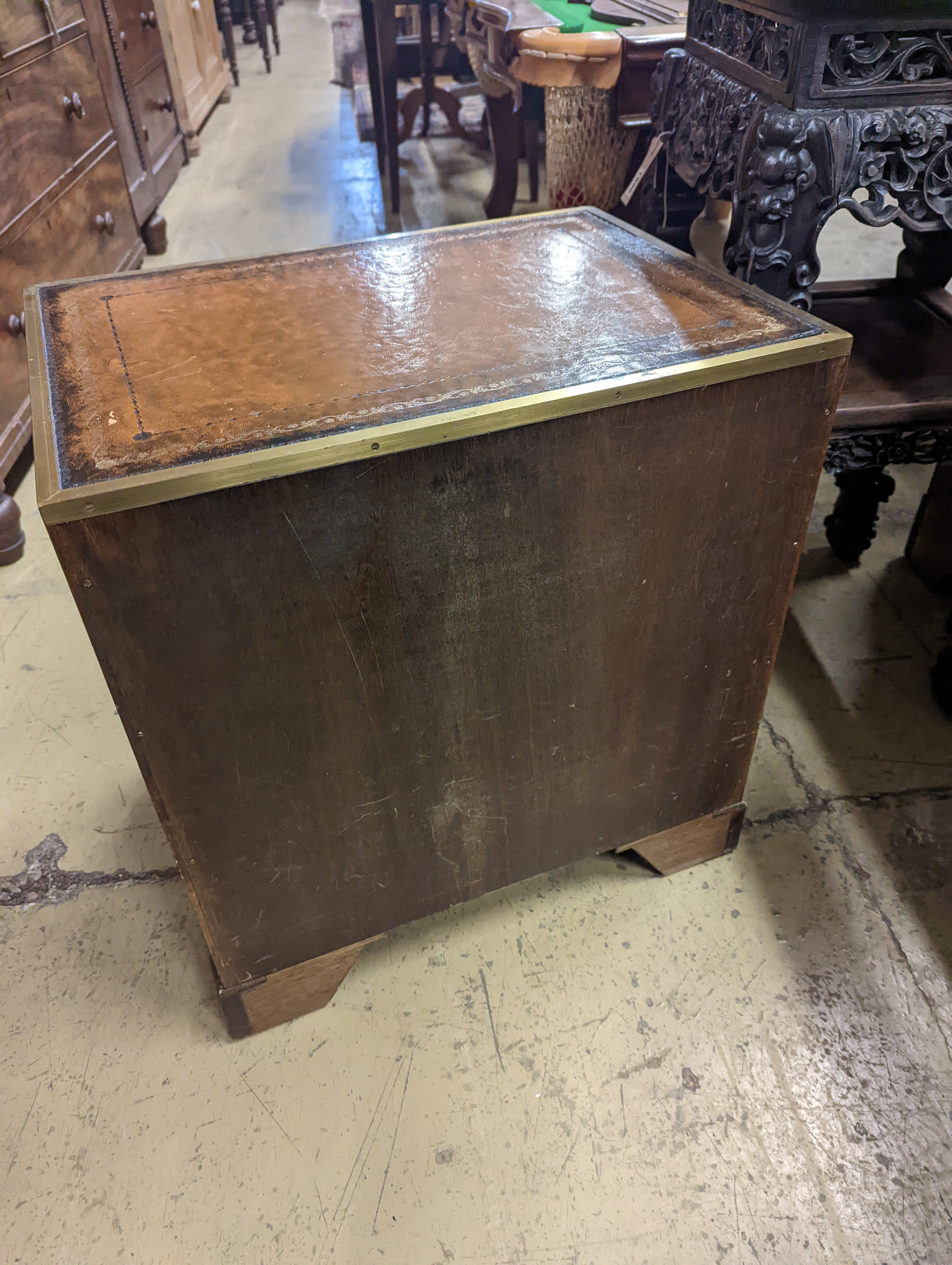 A pair of reproduction brass mounted military style yew veneered bedside chests with leather inset tops, width 56cm, depth 40cm, height 60cm